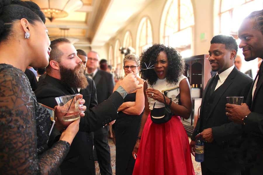 Meraux Dantes performing close-up magic for guests